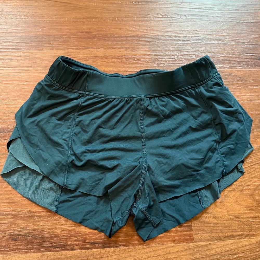 Lululemon green running shorts with flutter side